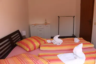 Ein Bett oder Betten in einem Zimmer der Unterkunft Gasthof Gruner Baum