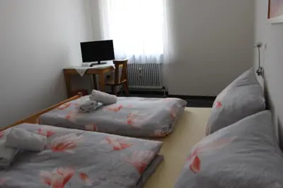 Ein Bett oder Betten in einem Zimmer der Unterkunft Gasthof Gruner Baum
