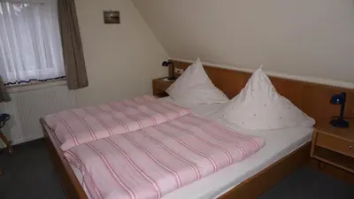 Ein Bett oder Betten in einem Zimmer der Unterkunft Landhaus Wölfel