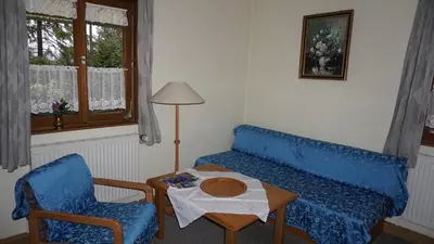 Ein Sitzbereich in der Unterkunft Landhaus Wölfel