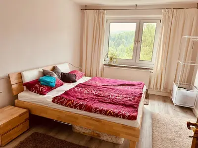 Ein Bett oder Betten in einem Zimmer der Unterkunft Fewo Bergblick