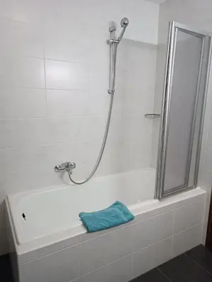 Ein Badezimmer in der Unterkunft Garni Hotel Post