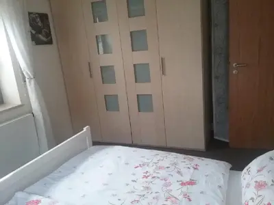 Ein Bett oder Betten in einem Zimmer der Unterkunft Ferienwohnung Dörfler