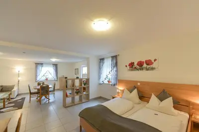 Ein Bett oder Betten in einem Zimmer der Unterkunft Gasthof Kolb