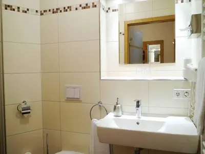 Ein Badezimmer in der Unterkunft Da`Sporrer Hotel & Wirtshaus