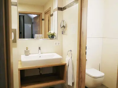 Ein Badezimmer in der Unterkunft Da`Sporrer Hotel & Wirtshaus