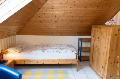 Ein Bett oder Betten in einem Zimmer der Unterkunft FeWo/GZ Hannelore Müller