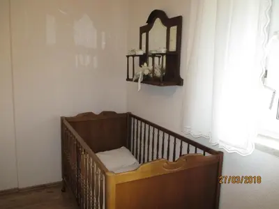 Ein Bett oder Betten in einem Zimmer der Unterkunft Ferienwohnung Pasek