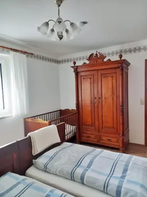 Ein Bett oder Betten in einem Zimmer der Unterkunft Ferienwohnung Pasek