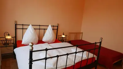 Ein Bett oder Betten in einem Zimmer der Unterkunft Reusa Apartments