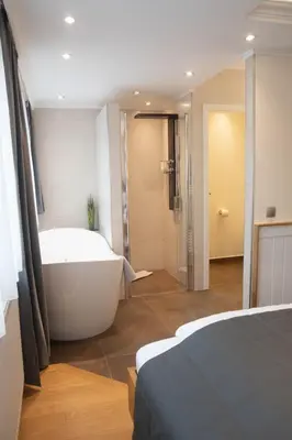 Ein Bett oder Betten in einem Zimmer der Unterkunft Hotel Stadtkrug