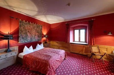 Ein Bett oder Betten in einem Zimmer der Unterkunft Burg Rabenstein