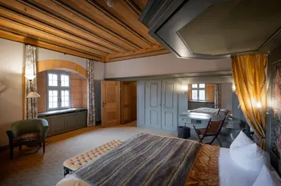 Ein Bett oder Betten in einem Zimmer der Unterkunft Burg Rabenstein
