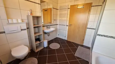 Ein Badezimmer in der Unterkunft 
