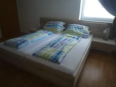 Ein Bett oder Betten in einem Zimmer der Unterkunft 