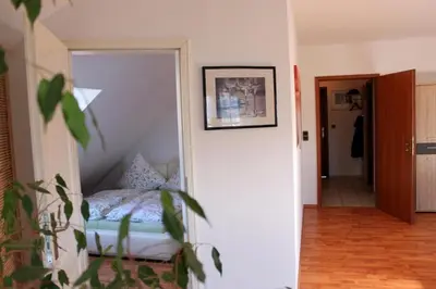 Ein Bett oder Betten in einem Zimmer der Unterkunft Ferienwohnung Raithel