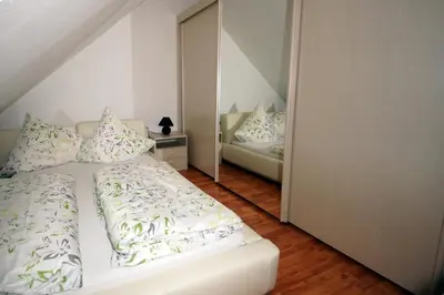 Ein Bett oder Betten in einem Zimmer der Unterkunft Ferienwohnung Raithel