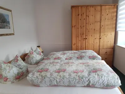 Ein Bett oder Betten in einem Zimmer der Unterkunft Ferienwohnungen Fam. Lippert