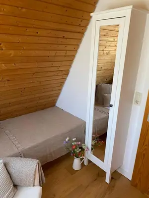 Ein Bett oder Betten in einem Zimmer der Unterkunft Ferienhaus am See im Fichtelgebirge