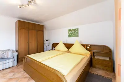 Ein Bett oder Betten in einem Zimmer der Unterkunft Ferienwohnung Haus Hanni