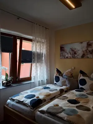 Ein Bett oder Betten in einem Zimmer der Unterkunft Ehem. Sächsisch-Bayrischer Hof