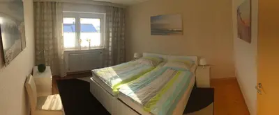 Ein Bett oder Betten in einem Zimmer der Unterkunft Haus Bergzauber