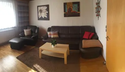 Ein Sitzbereich in der Unterkunft Haus Bergzauber