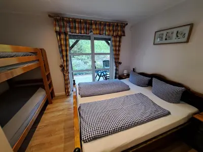 Ein Bett oder Betten in einem Zimmer der Unterkunft Appartementhaus am Fichtelberg