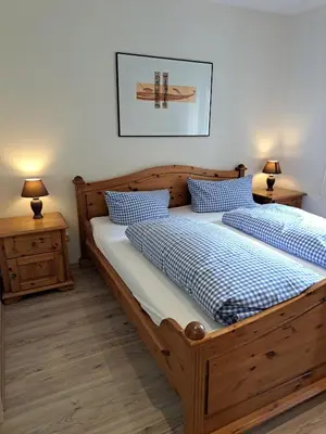 Ein Bett oder Betten in einem Zimmer der Unterkunft Appartementhaus am Fichtelberg