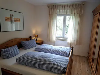 Ein Bett oder Betten in einem Zimmer der Unterkunft Appartementhaus am Fichtelberg