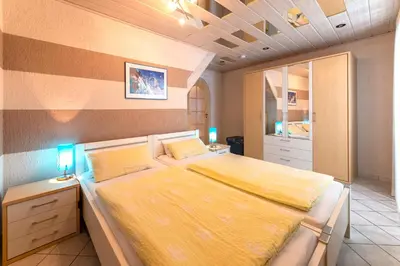 Ein Bett oder Betten in einem Zimmer der Unterkunft Ferienwohnung Mathilde
