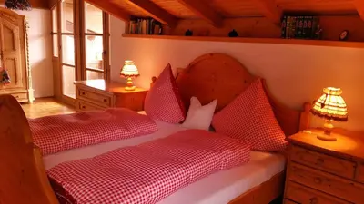 Ein Bett oder Betten in einem Zimmer der Unterkunft Ferienhaus Hornauer