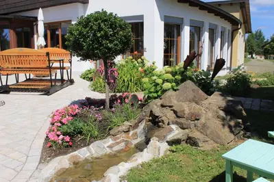 Ein Garten an der Unterkunft Landhotel Kastanienhof