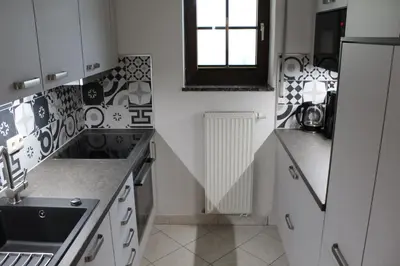 Küche/Küchenzeile in der Unterkunft Ferienwohnung Korn mit Tiefgarage und Skiraum