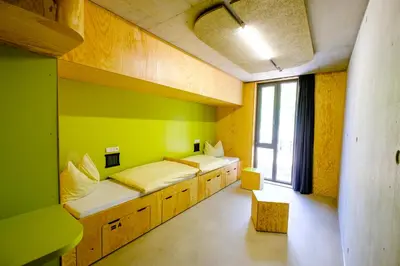 Ein Bett oder Betten in einem Zimmer der Unterkunft Jugendherberge Bayreuth