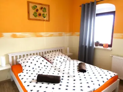 Ein Bett oder Betten in einem Zimmer der Unterkunft Ferienwohnung Paul Schwarzenberg