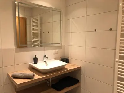 Ein Badezimmer in der Unterkunft Schelterhof