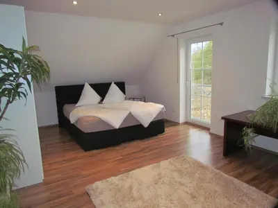 Ein Bett oder Betten in einem Zimmer der Unterkunft Ferien- bzw. Zeitwohnen Burglengenfeld