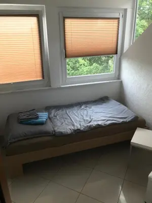 Ein Bett oder Betten in einem Zimmer der Unterkunft Wieko Ferienwohnungen