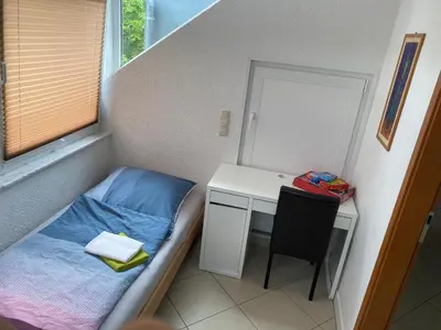 Ein Bett oder Betten in einem Zimmer der Unterkunft Wieko Ferienwohnungen