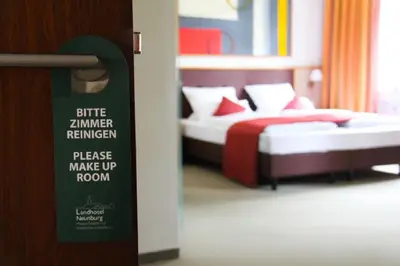 Ein Bett oder Betten in einem Zimmer der Unterkunft Landhotel-Neunburg