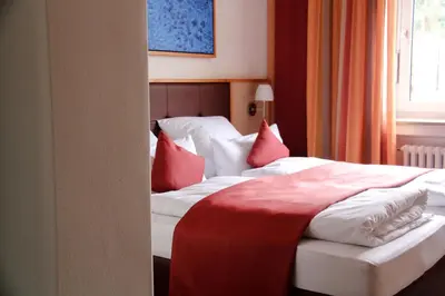 Ein Bett oder Betten in einem Zimmer der Unterkunft Landhotel-Neunburg