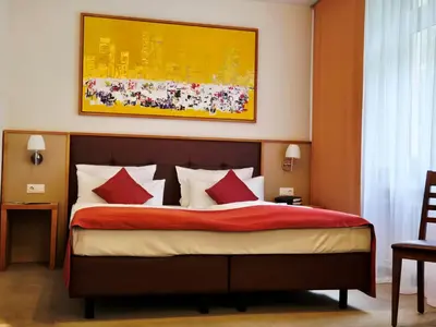 Ein Bett oder Betten in einem Zimmer der Unterkunft Landhotel-Neunburg