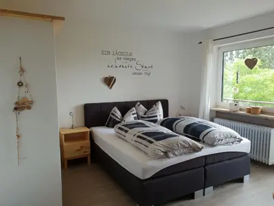Ein Bett oder Betten in einem Zimmer der Unterkunft Pension und Gasthof Reithmeier