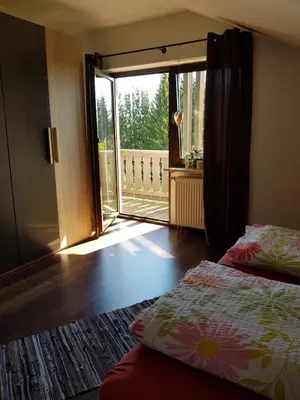 Ein Bett oder Betten in einem Zimmer der Unterkunft Pension und Gasthof Reithmeier