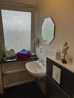 Ein Badezimmer in der Unterkunft Pension und Gasthof Reithmeier