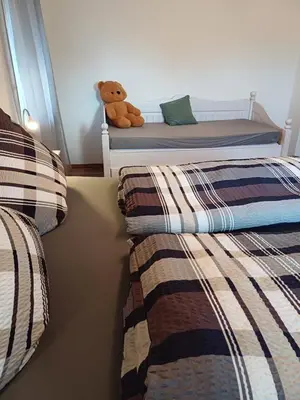 Ein Bett oder Betten in einem Zimmer der Unterkunft Pension und Gasthof Reithmeier