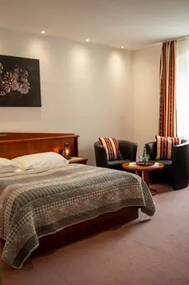 Ein Bett oder Betten in einem Zimmer der Unterkunft Das kleine Landhotel im Fichtelgebirge