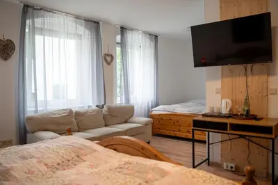 Ein Bett oder Betten in einem Zimmer der Unterkunft Das kleine Landhotel im Fichtelgebirge