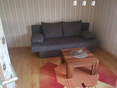 Ein Sitzbereich in der Unterkunft Ferienwohnung am Aschberg